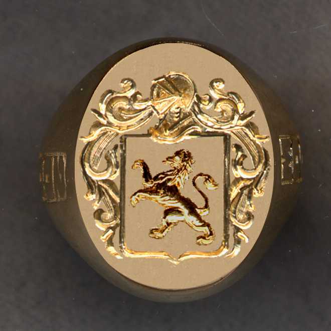 Ring after we removed a broken stone and substituted a plate of 14k gold where we have engraved a family crest